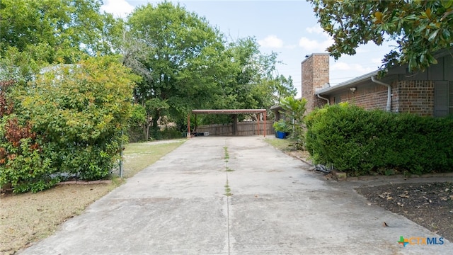 405 Carothers St, Copperas Cove, TX 76522 - view of community with concrete driveway and a detached carport