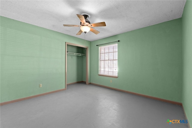 405 Carothers St, Copperas Cove, TX 76522 - unfurnished bedroom featuring a closet, finished concrete floors, a ceiling fan, and a textured ceiling