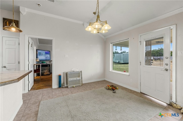 unfurnished dining area with an inviting chandelier, light tile patterned floors, and ornamental molding