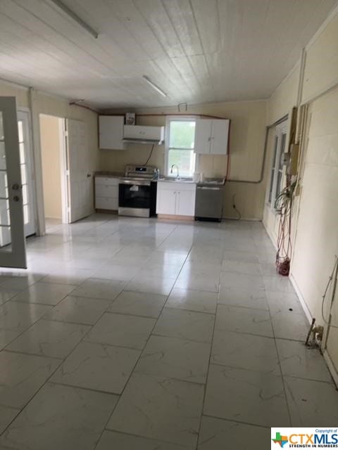 kitchen with marble finish floor, a sink, white cabinetry, stainless steel appliances, and extractor fan