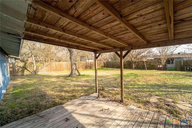 deck featuring a lawn