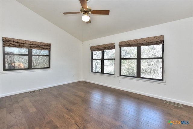 unfurnished room featuring dark wood-type flooring, vaulted ceiling, and ceiling fan