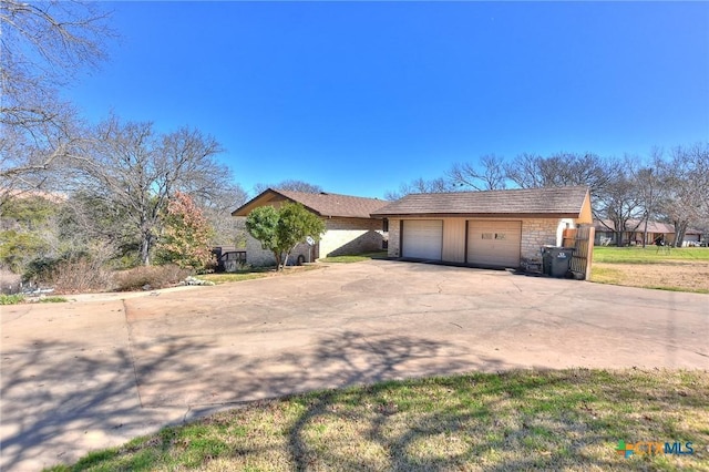 view of property exterior with a garage