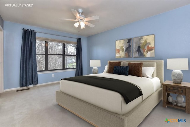 carpeted bedroom featuring ceiling fan