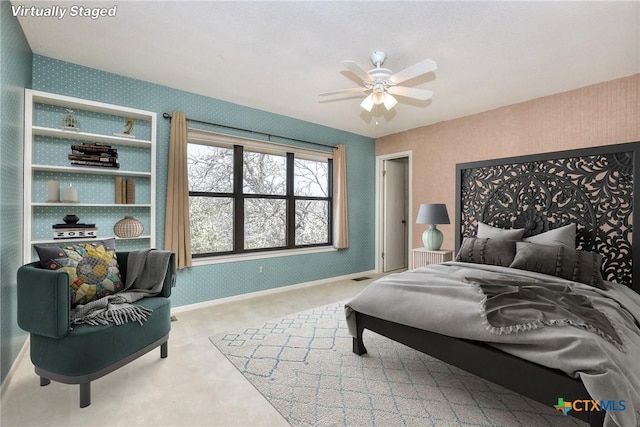 carpeted bedroom with ceiling fan