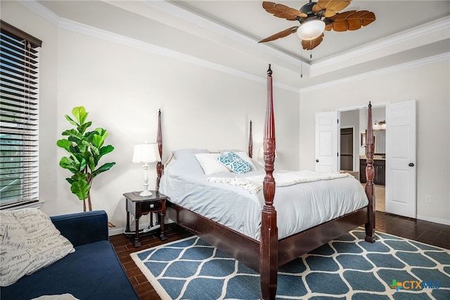 2051 Western Pecan, New Braunfels, TX 78130 - bedroom featuring crown molding, a tray ceiling, wood finished floors, and baseboards