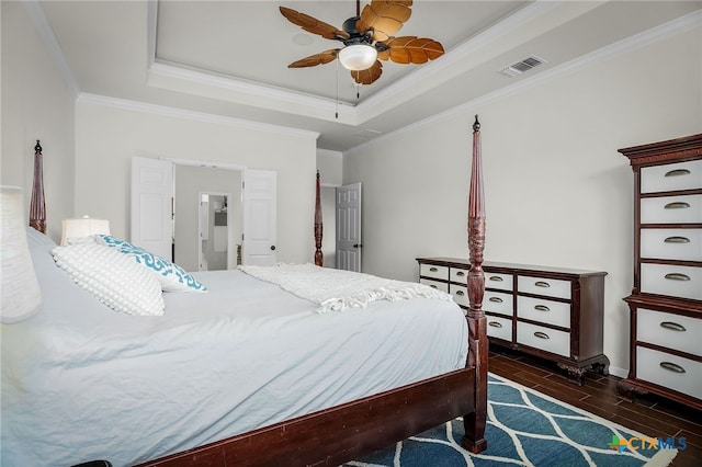 2051 Western Pecan, New Braunfels, TX 78130 - bedroom with a raised ceiling, visible vents, ornamental molding, wood finished floors, and a ceiling fan
