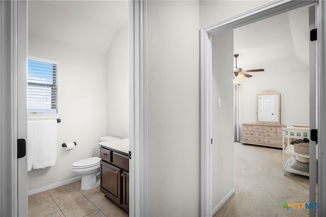 2051 Western Pecan, New Braunfels, TX 78130 - bathroom featuring vanity, toilet, a ceiling fan, baseboards, and lofted ceiling