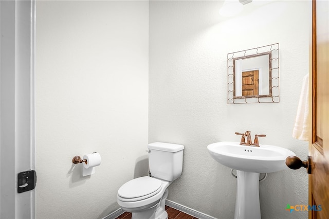 2051 Western Pecan, New Braunfels, TX 78130 - half bath with toilet, wood finished floors, and baseboards