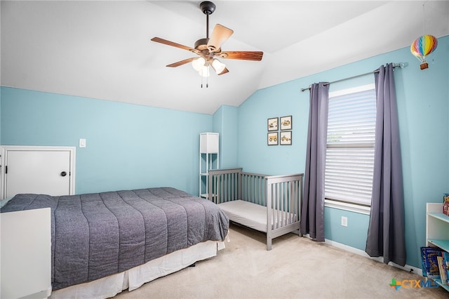 2051 Western Pecan, New Braunfels, TX 78130 - bedroom with carpet floors, a ceiling fan, vaulted ceiling, and multiple windows