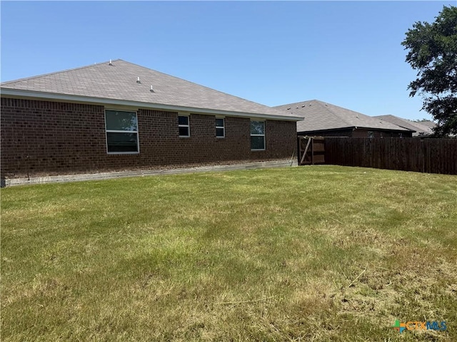 1307 Liberation Ln, Copperas Cove, TX 76522 - rear view of house with brick siding