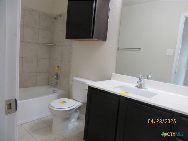 bathroom with toilet, vanity, tile patterned flooring, and shower / bath combination