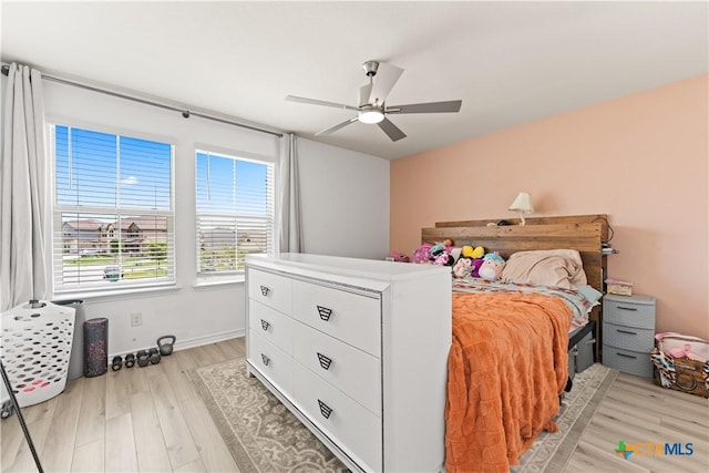 5998 Galveston Rd, Belton, TX 76513 - bedroom featuring light wood-type flooring, ceiling fan, and baseboards