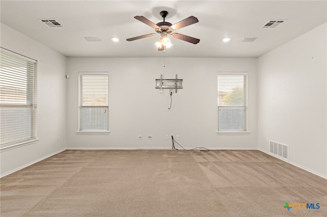 1505 Line Dance Ct, Killeen, TX 76542 - unfurnished room featuring light colored carpet, plenty of natural light, a ceiling fan, and recessed lighting