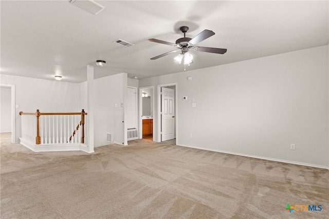 1505 Line Dance Ct, Killeen, TX 76542 - unfurnished room with light colored carpet, ceiling fan, and baseboards