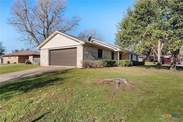 single story home featuring brick siding, a front lawn, concrete driveway, and a garage