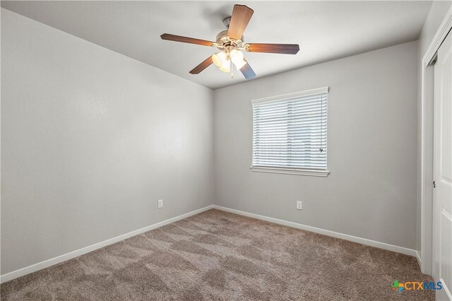 8113 Iron Gate Dr, Temple, TX 76502 - empty room featuring carpet floors and a ceiling fan