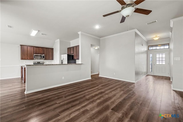 8113 Iron Gate Dr, Temple, TX 76502 - kitchen featuring stainless steel microwave, fridge with ice dispenser, crown molding, dark wood-type flooring, and open floor plan