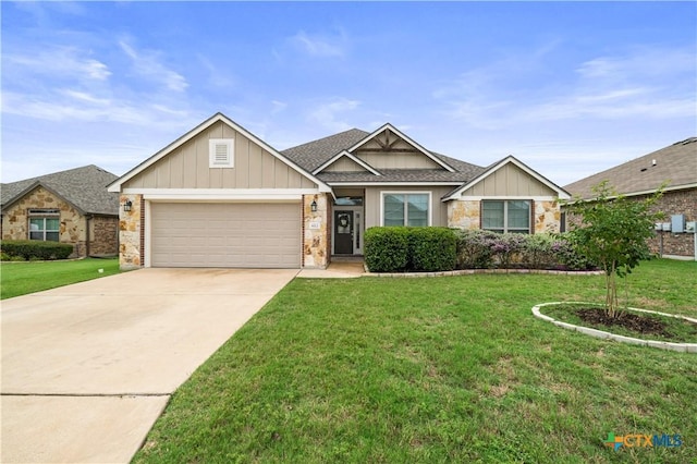 8113 Iron Gate Dr, Temple, TX 76502 - view of front facade with a garage, board and batten siding, a front yard, and driveway