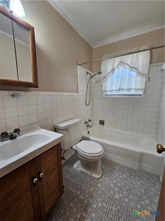 full bathroom with toilet, vanity, ornamental molding, tile walls, and  shower combination