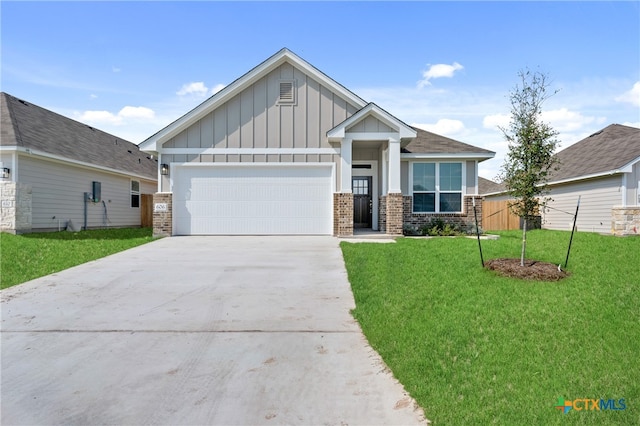 craftsman inspired home with a garage and a front yard