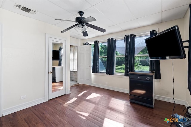215 Taylor Rd, Elgin, TX 78621 - unfurnished bedroom with baseboards, visible vents, and wood finished floors