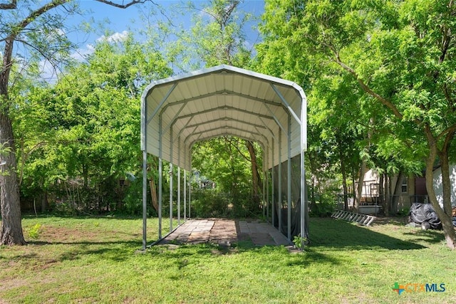 215 Taylor Rd, Elgin, TX 78621 - view of car parking with a detached carport