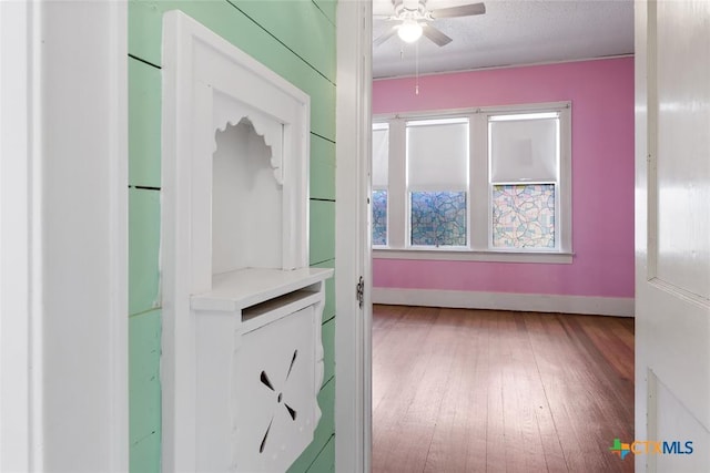215 Taylor Rd, Elgin, TX 78621 - corridor with baseboards and light wood finished floors