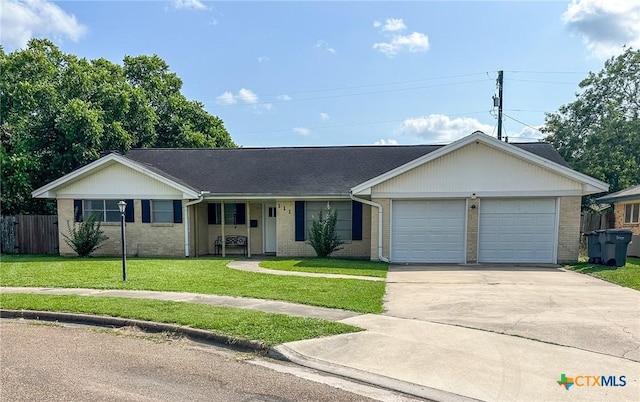 111 Kenilworth Glen St, Victoria, TX 77904 - single story home featuring brick siding, a garage, and concrete driveway