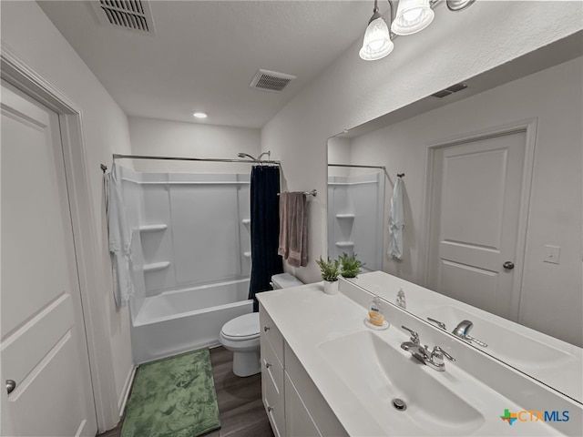 full bathroom featuring toilet, vanity, shower / bath combo with shower curtain, and wood-type flooring