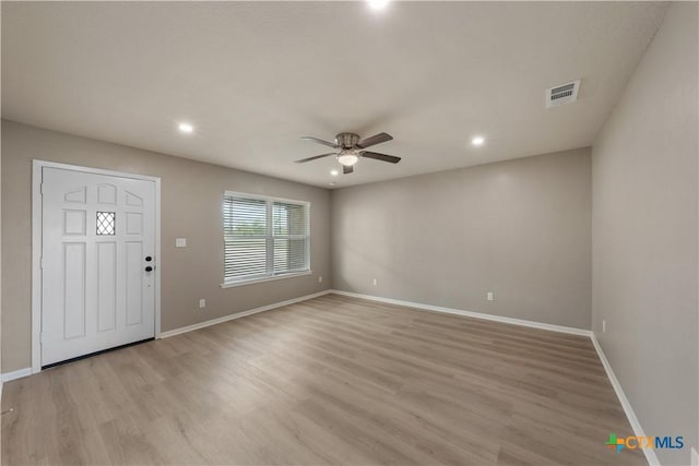 entryway featuring ceiling fan and light hardwood / wood-style flooring