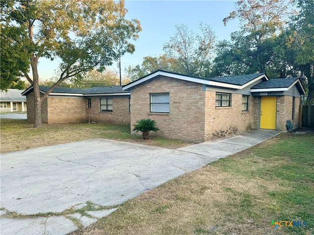 exterior space with a lawn