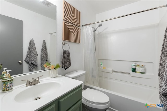 full bathroom featuring vanity, toilet, and shower / tub combo with curtain