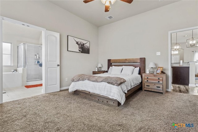 bedroom featuring ceiling fan, carpet floors, and connected bathroom