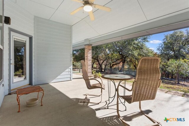 view of patio featuring ceiling fan