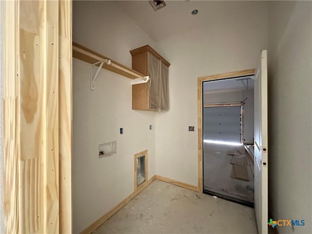 2026 Yarrow Rd, Temple, TX 76502 - laundry area featuring washer hookup, cabinet space, and baseboards