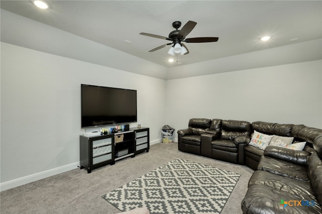 living area featuring baseboards, a ceiling fan, recessed lighting, and light carpet