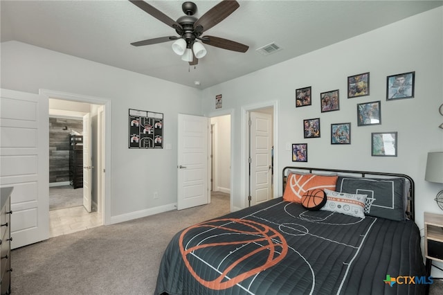bedroom featuring carpet floors, baseboards, visible vents, and ceiling fan