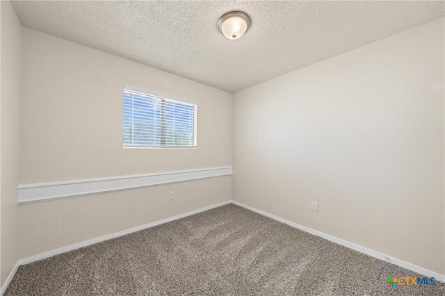 116 Spur Dr, Copperas Cove, TX 76522 - empty room with carpet floors and a textured ceiling