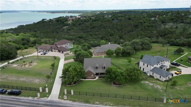 bird's eye view of a forest and a nearby body of water