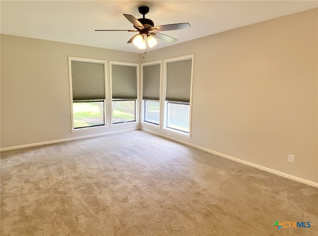 507 Santa Fe, Victoria, TX 77904 - spare room featuring carpet and a ceiling fan