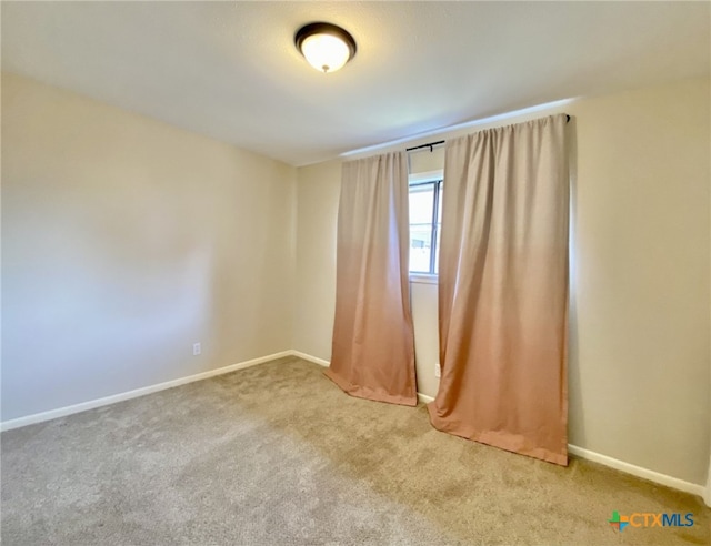 507 Santa Fe, Victoria, TX 77904 - empty room with light carpet and baseboards