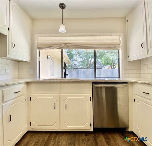 507 Santa Fe, Victoria, TX 77904 - kitchen with dishwasher, white cabinets, and tasteful backsplash