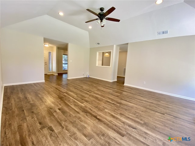 507 Santa Fe, Victoria, TX 77904 - unfurnished living room featuring vaulted ceiling, a ceiling fan, wood finished floors, and recessed lighting