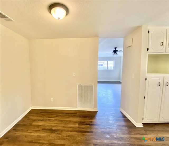 507 Santa Fe, Victoria, TX 77904 - unfurnished room with dark wood-style floors and ceiling fan