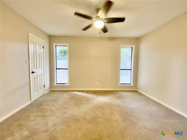 507 Santa Fe, Victoria, TX 77904 - carpeted spare room with plenty of natural light and a ceiling fan