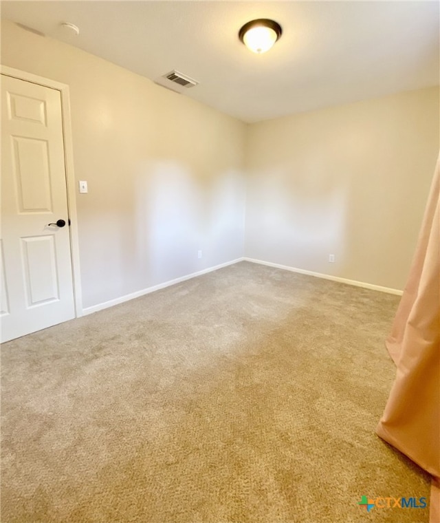 507 Santa Fe, Victoria, TX 77904 - carpeted spare room featuring baseboards