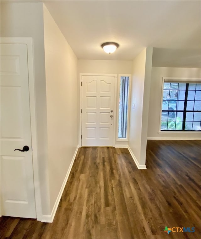 507 Santa Fe, Victoria, TX 77904 - entrance foyer with baseboards and dark wood finished floors