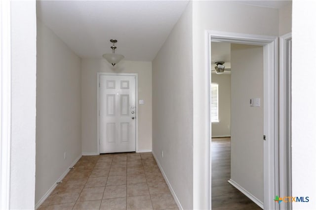 1321 Cozy Creek Dr, Temple, TX 76502 - hallway with baseboards and light tile patterned floors