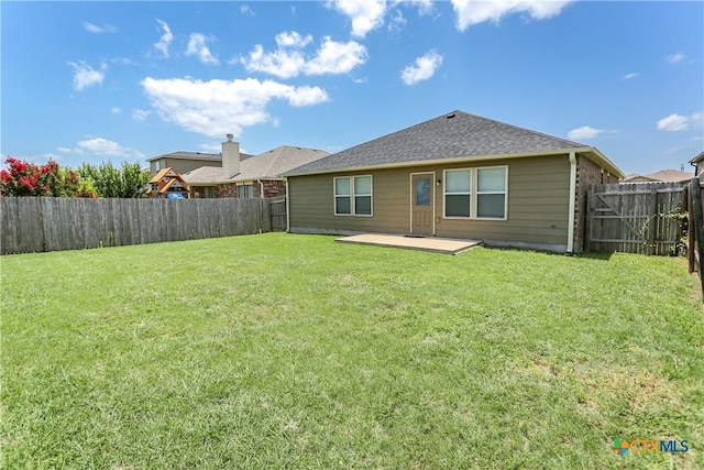 1321 Cozy Creek Dr, Temple, TX 76502 - back of house with a fenced backyard and a shingled roof